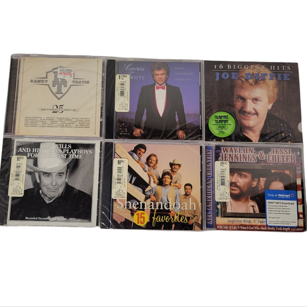 NWT & NWOT Various male country artist compact discs